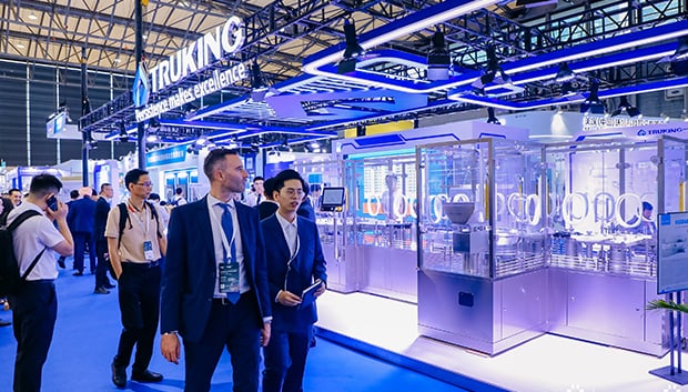 Pharma professional showcasing products at exhibition
