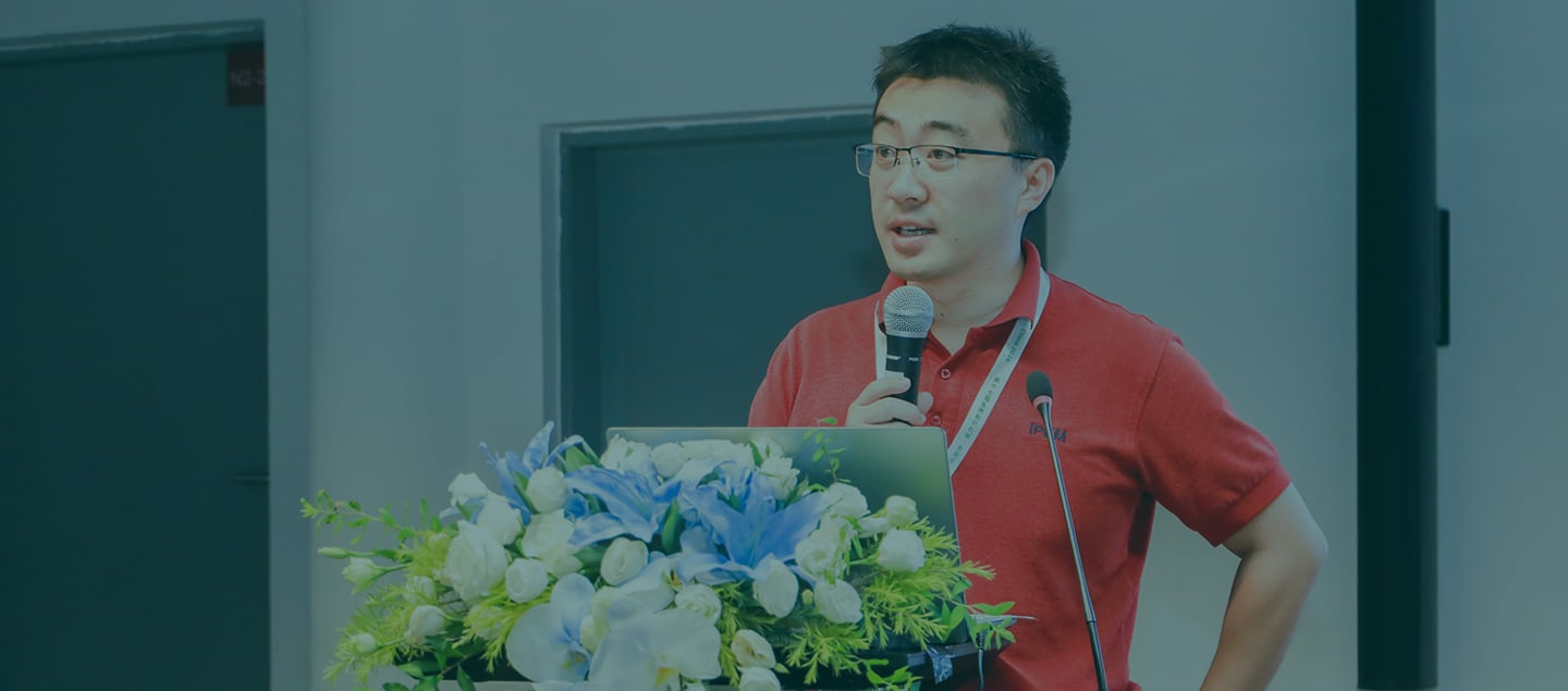 male presenting on stage