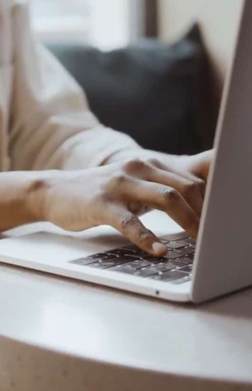 close up image of someone using laptop
