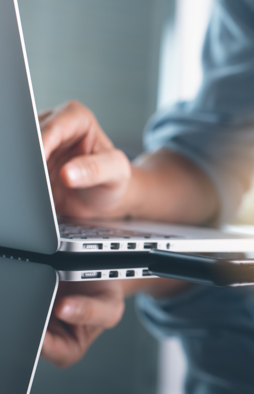 Person using laptop on table