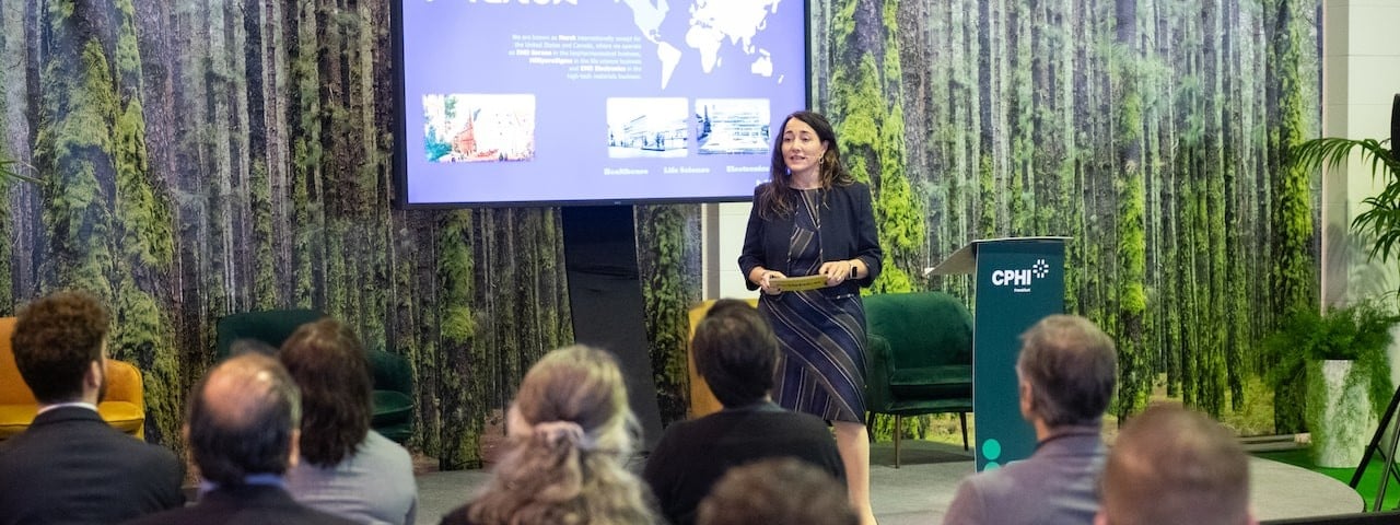 Female presenting on stage