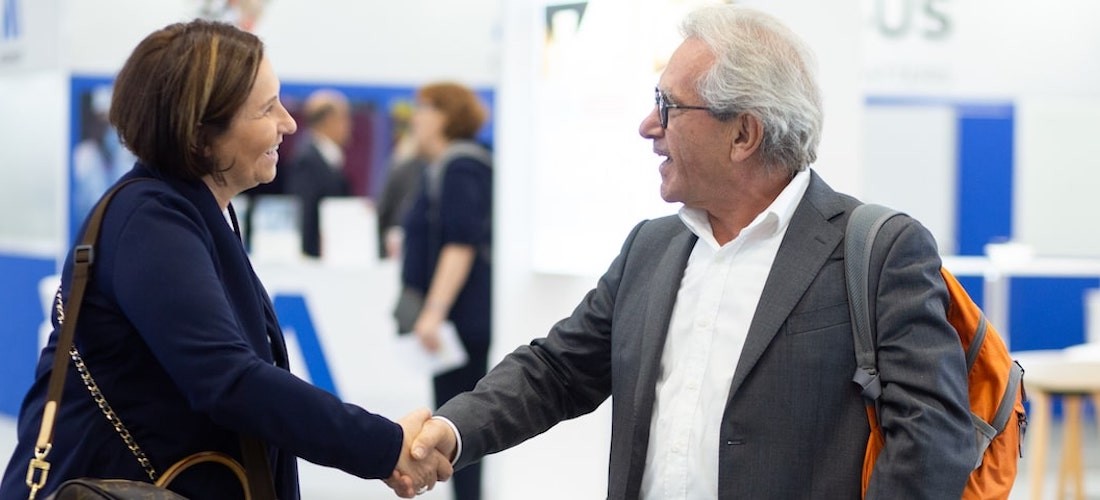 Pharma professionals shaking hands