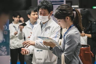 Pharma individuals greeting each other at CPHI Japan