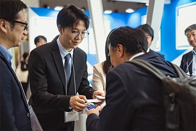 Pharma individuals greeting each other at CPHI Japan