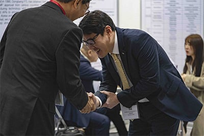 Pharma individuals greeting each other at CPHI Japan