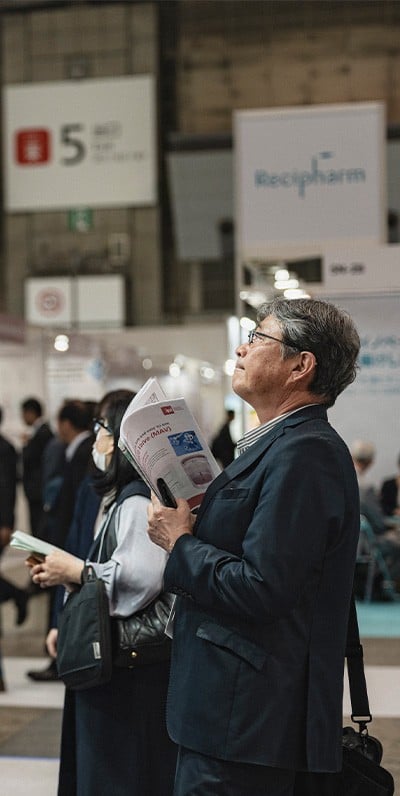 Male professional showcasing pharma products