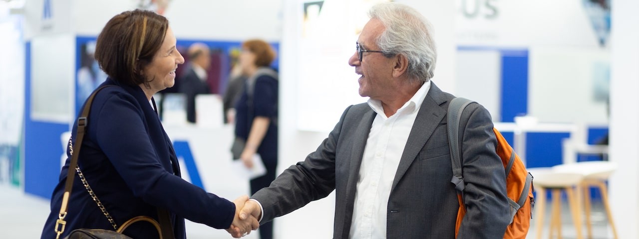 two female pharma professionals having a conversation at CPHI North America event