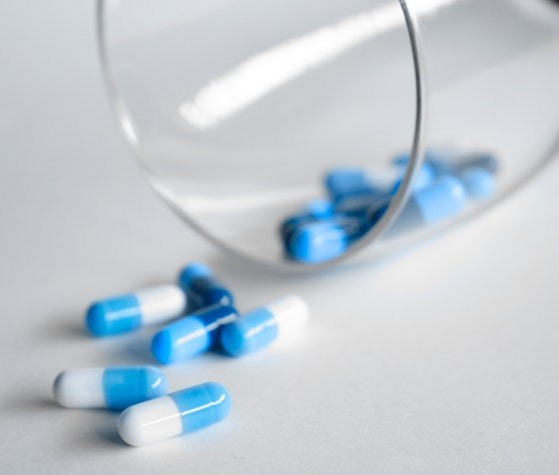 pills inside a glass